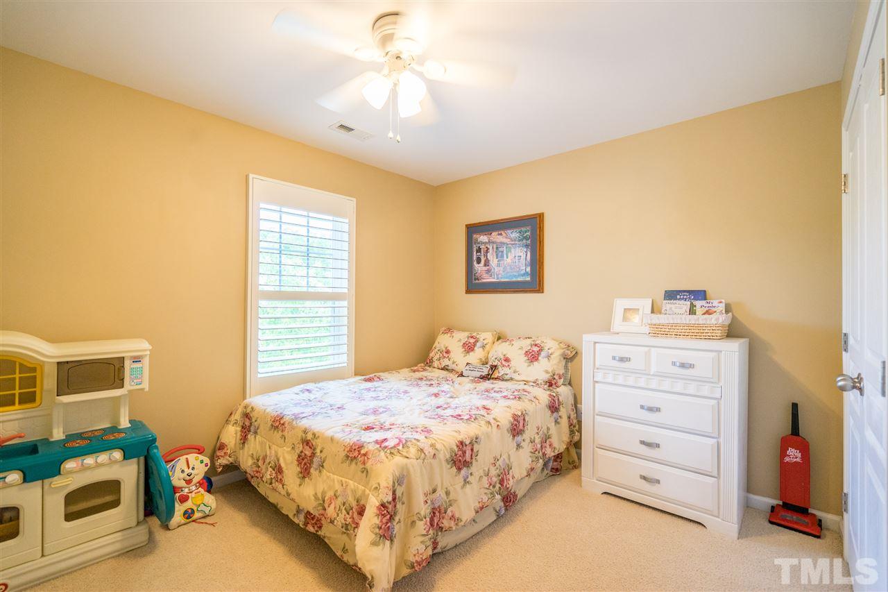 3307 Ranbir Drive Durham, NC 27713 - Photo 18 of 25 a bedroom with a bed and a window