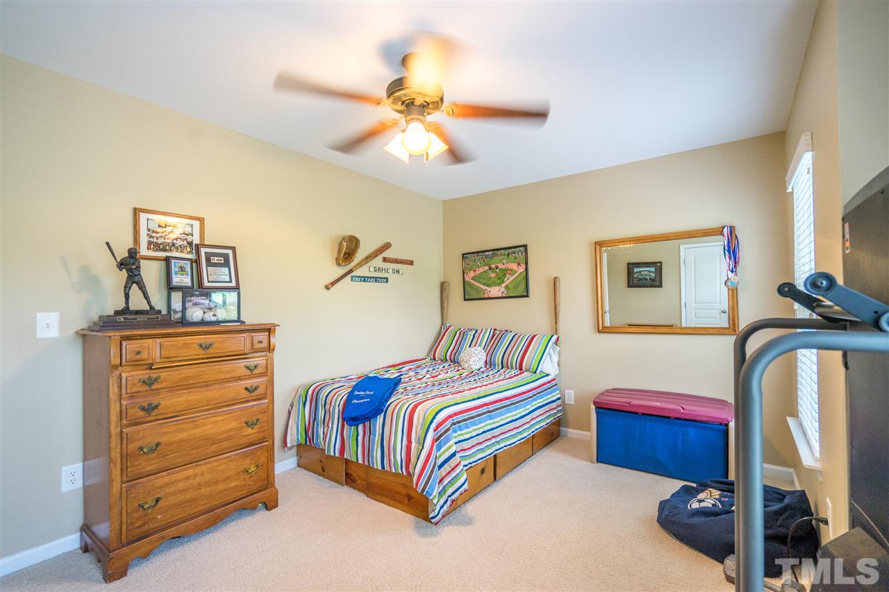 3307 Ranbir Drive Durham, NC 27713 - Photo 20 of 25 a bedroom with a bed and a closet