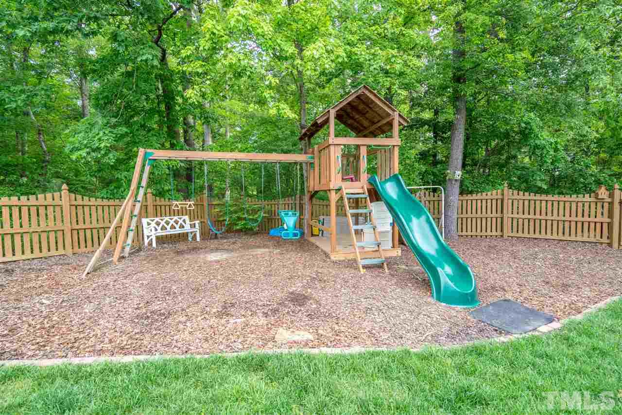 3307 Ranbir Drive Durham, NC 27713 - Photo 23 of 25 a view of a yard with a slide