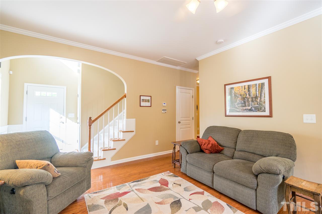3307 Ranbir Drive Durham, NC 27713 - Photo 5 of 25 a living room with furniture and a rug