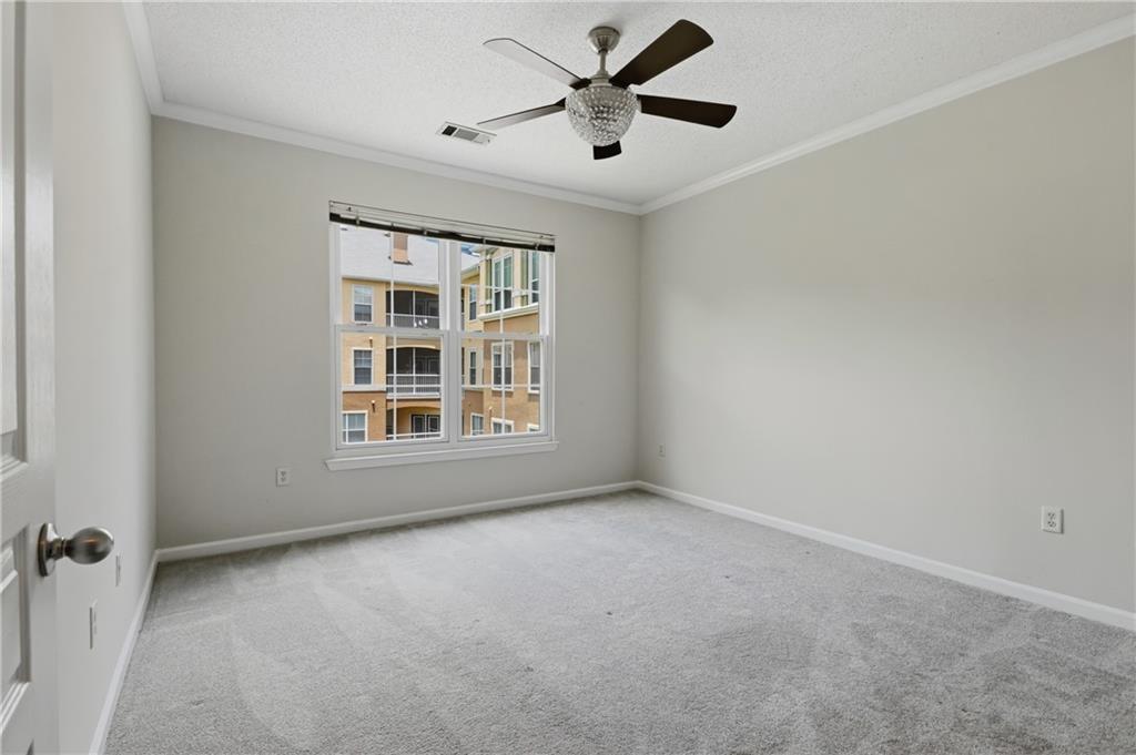 10 Perimeter Summit Boulevard, Unit 3311 Atlanta, GA 30319 - Photo 57 of 68 a view of an empty room with a window