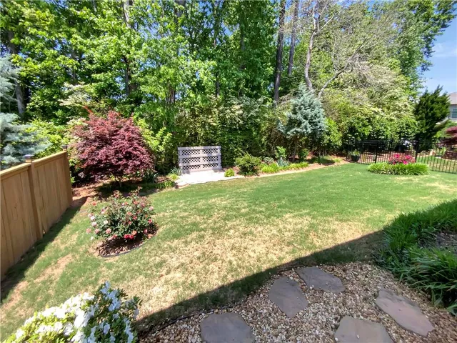 a view of a garden with an outdoor space