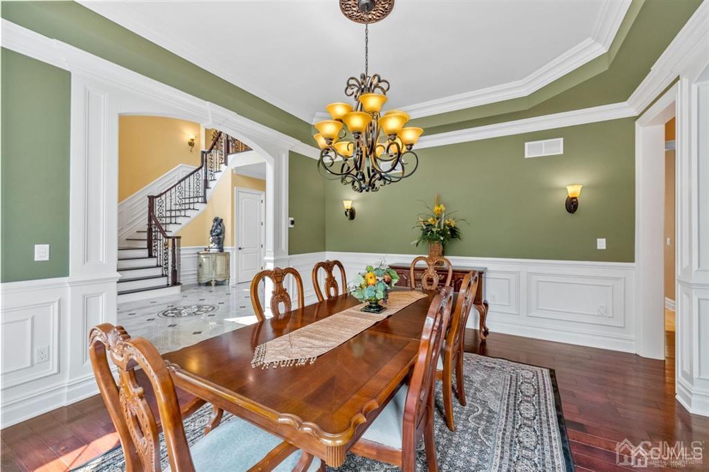 31 Round Top Road Warren, NJ 07059 - Photo 14 of 39 a view of a dining room with furniture and wooden floor