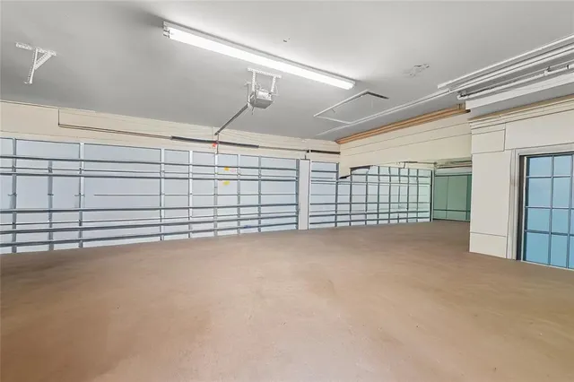 a balcony with wooden floor and lake view