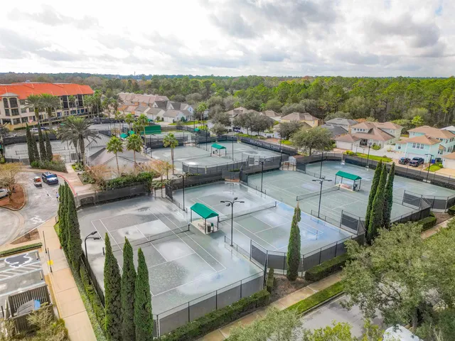 a view of an chairs and table in patio