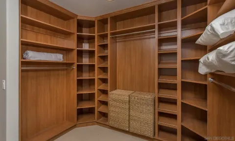 a view of an empty walk in closet