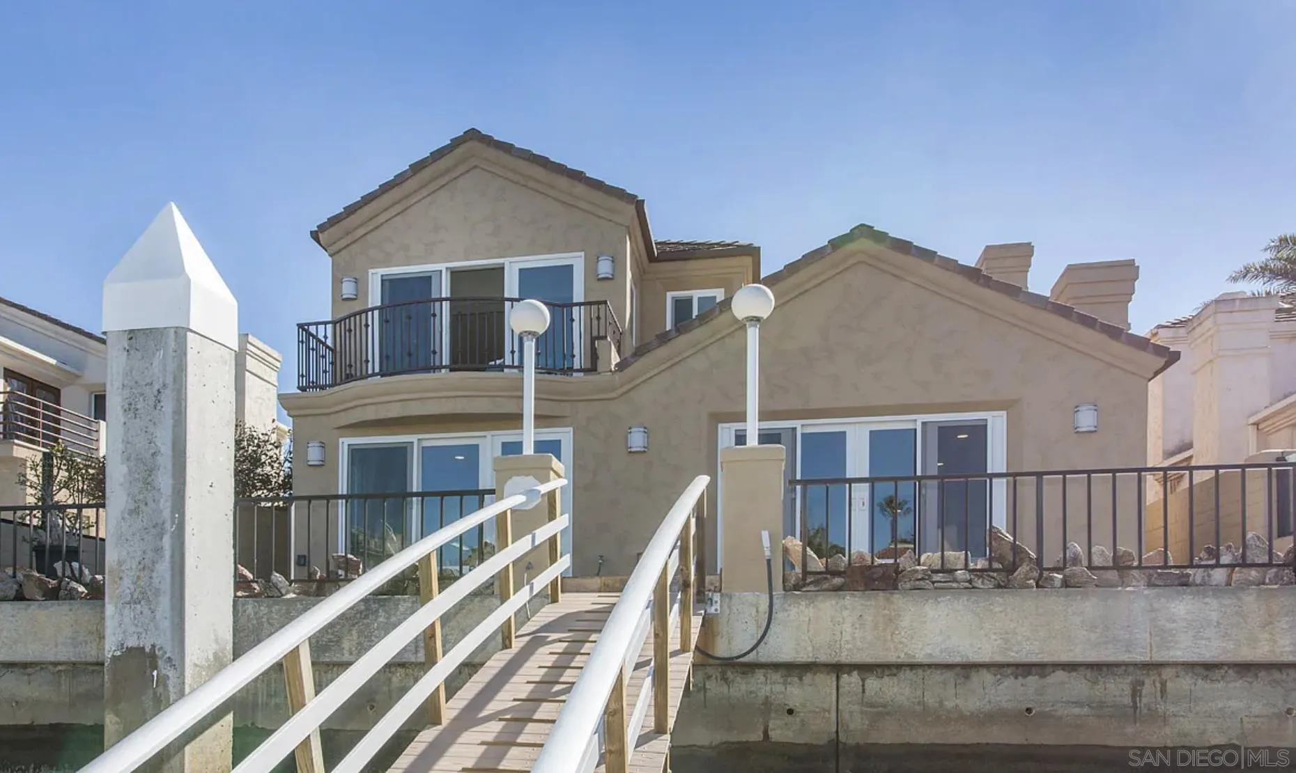 48 Spinnaker Way Coronado, CA 92118 - Photo 3 of 29 a view of a house with balcony
