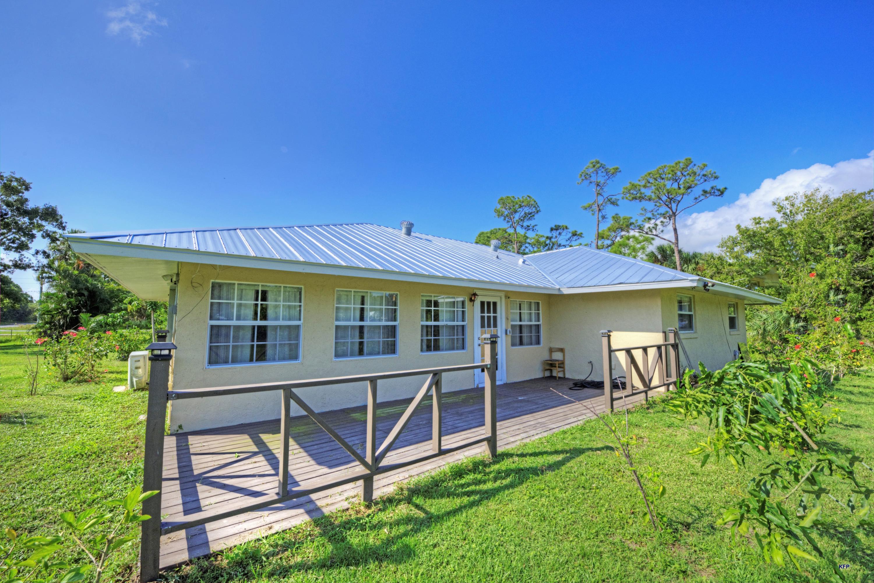 424 East Weatherbee Road Fort Pierce, FL 34982 - Photo 1 of 43 FRONT 1