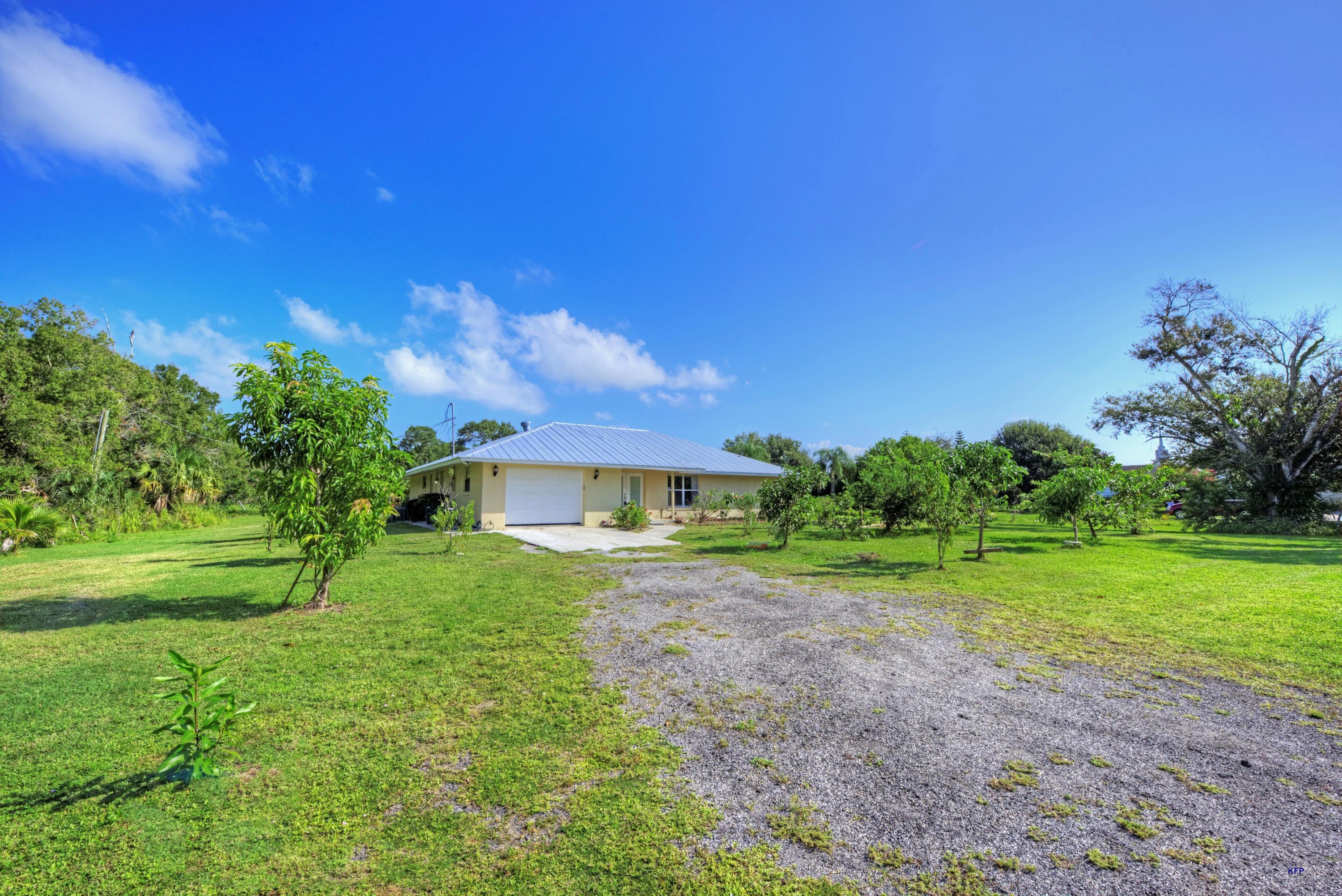 424 East Weatherbee Road Fort Pierce, FL 34982 - Photo 2 of 43 448A374A-00C4-4E95-92CA-CB87C90F0E8B
