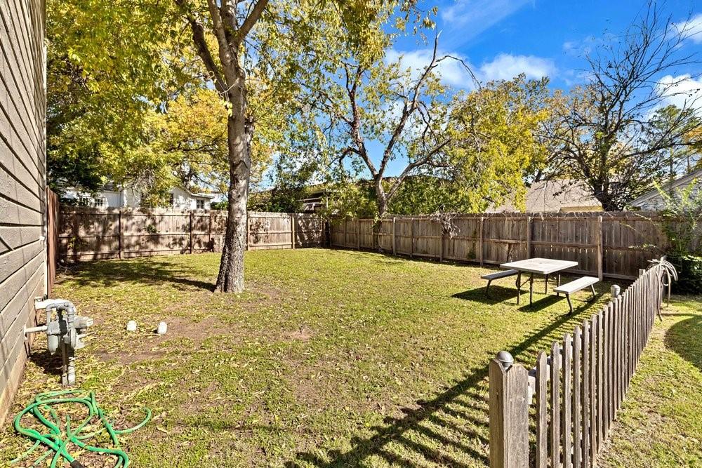 608 West Hickory Street, Unit B Denton, TX 76201 - Photo 11 of 19 a view of backyard with tree