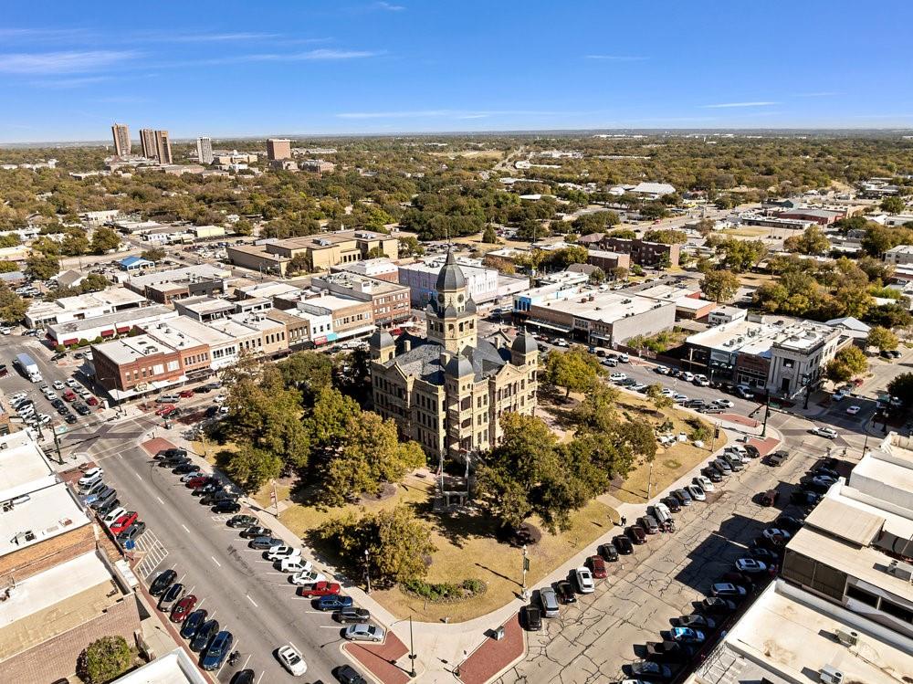 608 West Hickory Street, Unit B Denton, TX 76201 - Photo 18 of 19 an aerial view of residential houses with outdoor space