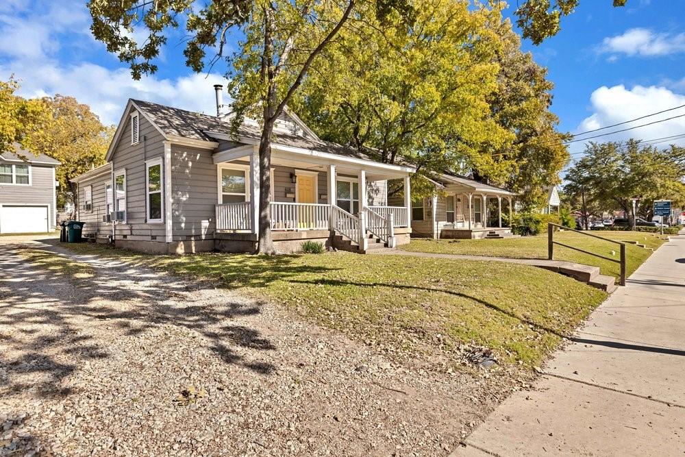 608 West Hickory Street, Unit B Denton, TX 76201 - Photo 2 of 19 a front view of a house with a yard
