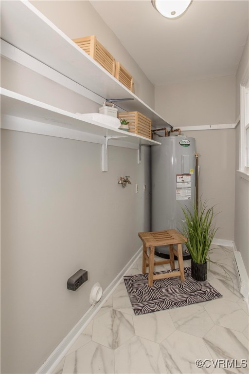 7856 Epic Road Richmond, VA 23235 - Photo 12 of 32 Laundry area featuring electric water heater, ligh