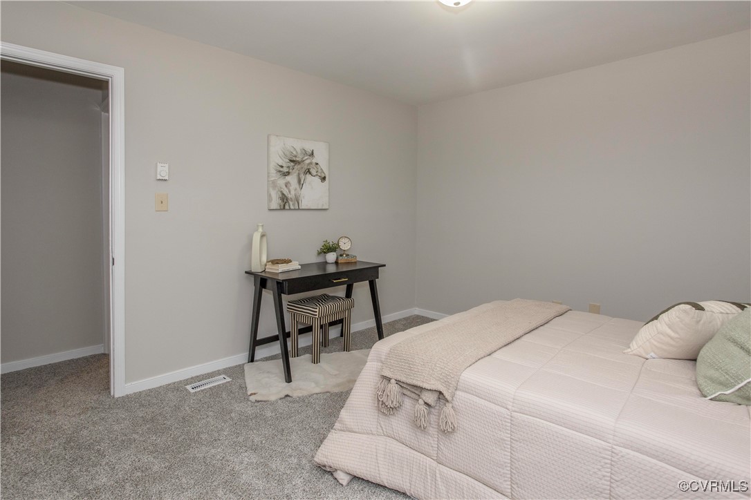 7856 Epic Road Richmond, VA 23235 - Photo 17 of 32 Bedroom featuring carpet floors and baseboards