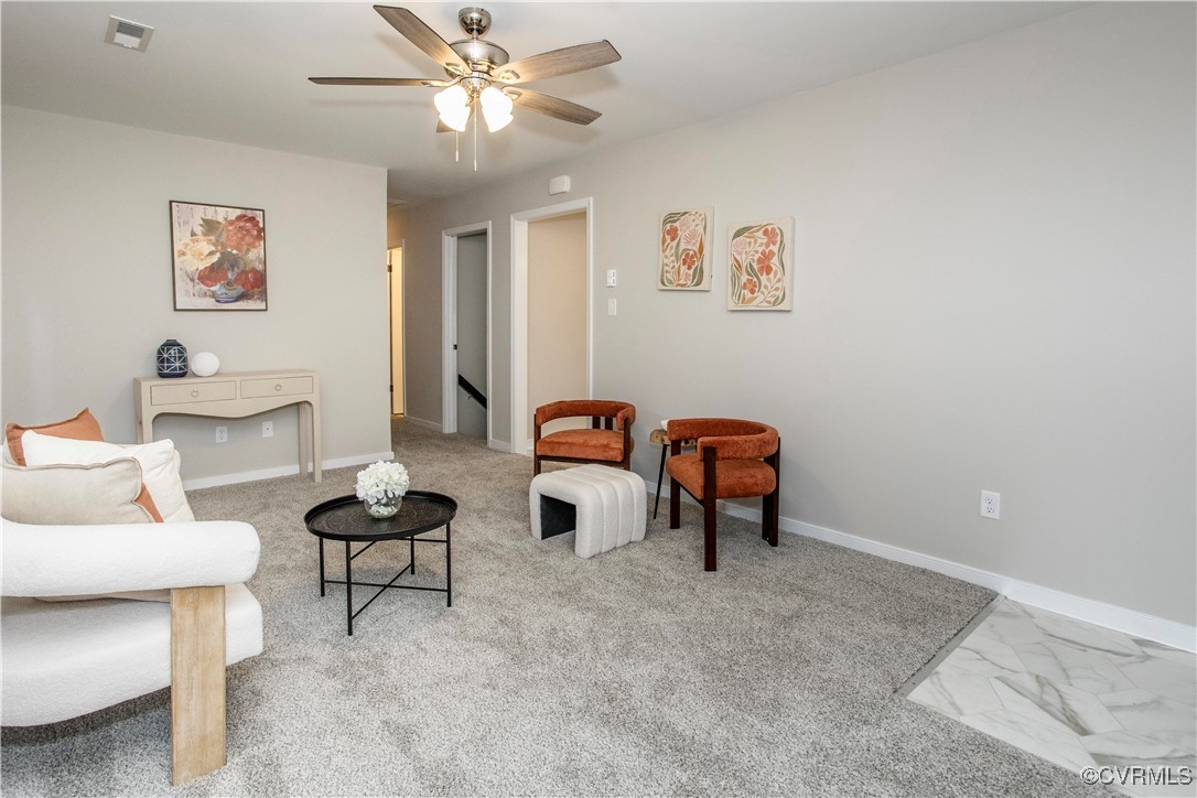 7856 Epic Road Richmond, VA 23235 - Photo 20 of 32 Living area featuring ceiling fan and baseboards