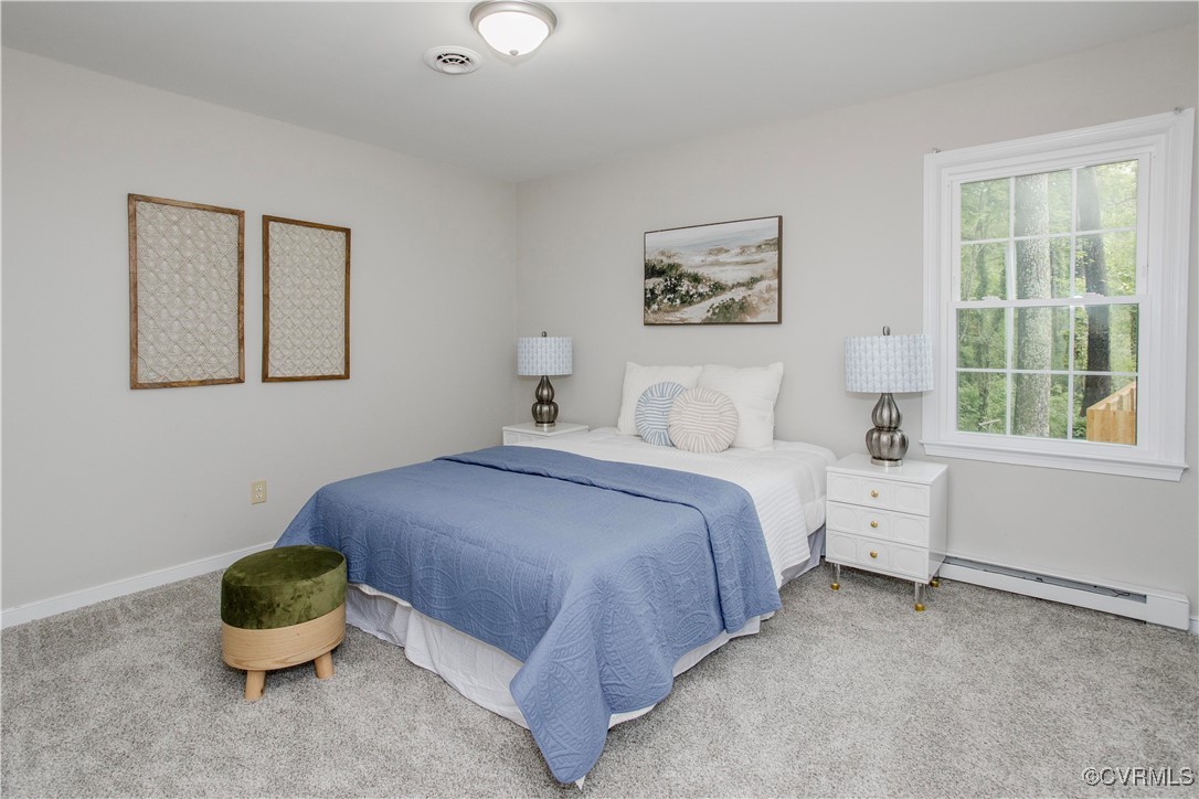 7856 Epic Road Richmond, VA 23235 - Photo 31 of 32 Carpeted bedroom featuring a baseboard heating uni