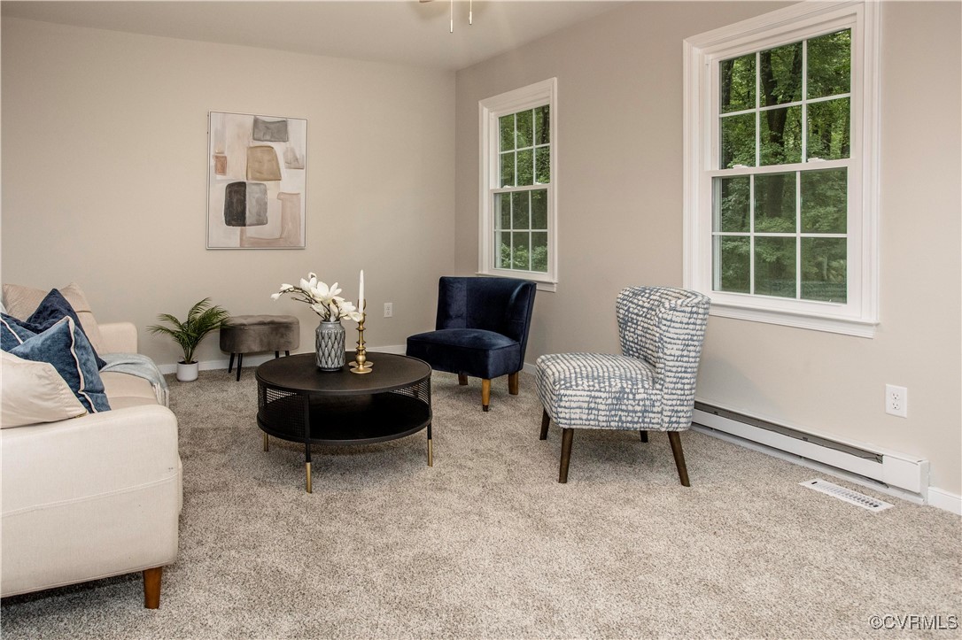 7856 Epic Road Richmond, VA 23235 - Photo 8 of 32 Living area with a baseboard radiator, plenty of n