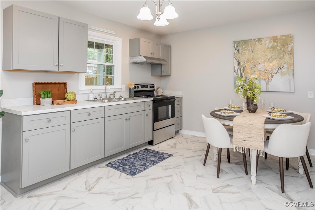 7856 Epic Road Richmond, VA 23235 - Photo 10 of 32 Kitchen featuring electric stove, gray cabinets, a