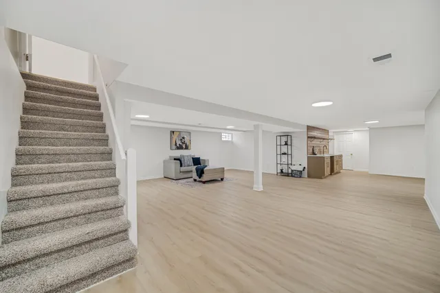 a view of a livingroom with a staircase