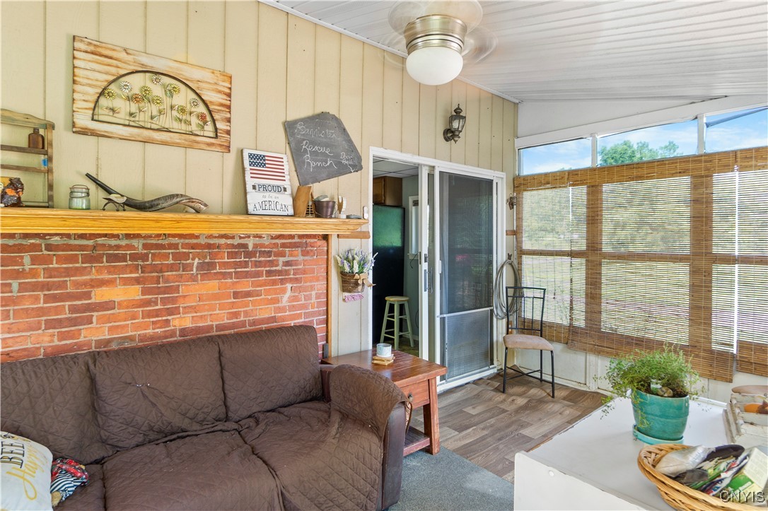 7410 Rice Road Throop, NY 13021 - Photo 4 of 45 Enclosed porch