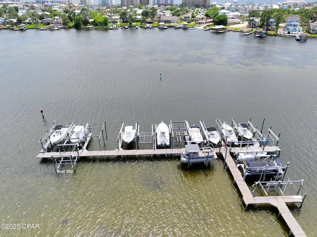 $705,000 | 7009 North Lagoon Drive, Unit 107, Panama City, FL 32408