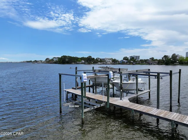 $705,000 | 7009 North Lagoon Drive, Unit 107, Panama City, FL 32408