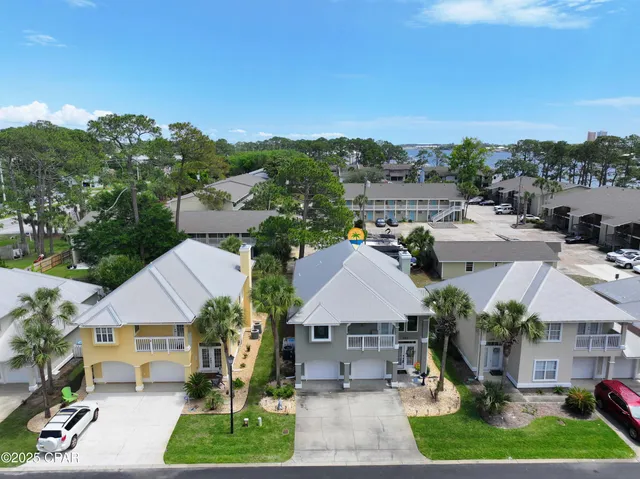 $705,000 | 7009 North Lagoon Drive, Unit 107, Panama City, FL 32408