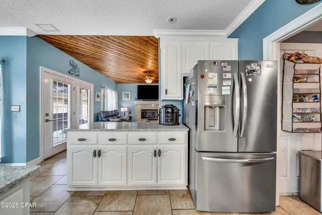 $705,000 | 7009 North Lagoon Drive, Unit 107, Panama City, FL 32408