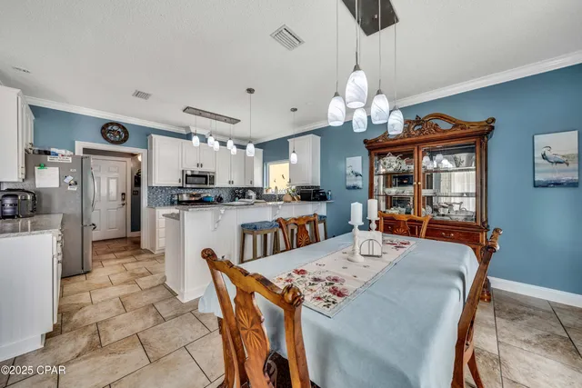 $705,000 | 7009 North Lagoon Drive, Unit 107, Panama City, FL 32408