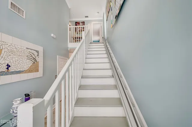 $705,000 | 7009 North Lagoon Drive, Unit 107, Panama City, FL 32408