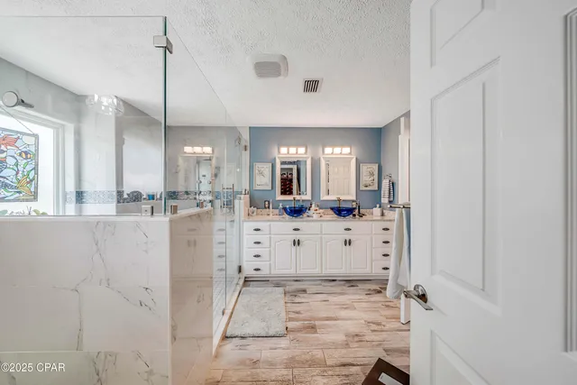 $705,000 | 7009 North Lagoon Drive, Unit 107, Panama City, FL 32408