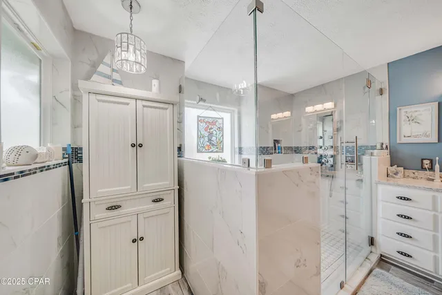 $705,000 | 7009 North Lagoon Drive, Unit 107, Panama City, FL 32408