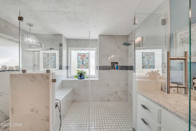 $705,000 | 7009 North Lagoon Drive, Unit 107, Panama City, FL 32408