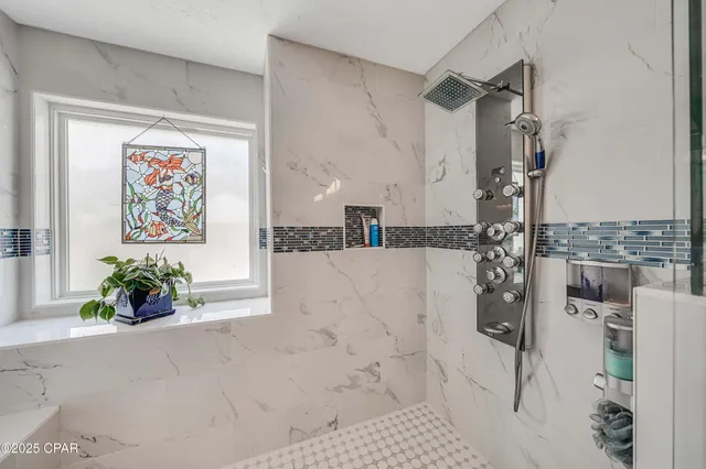 $705,000 | 7009 North Lagoon Drive, Unit 107, Panama City, FL 32408