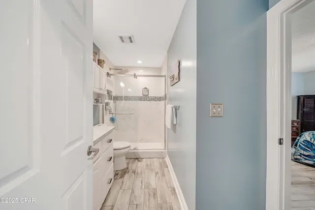 $705,000 | 7009 North Lagoon Drive, Unit 107, Panama City, FL 32408