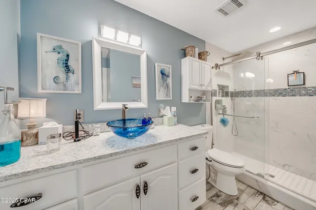 $705,000 | 7009 North Lagoon Drive, Unit 107, Panama City, FL 32408