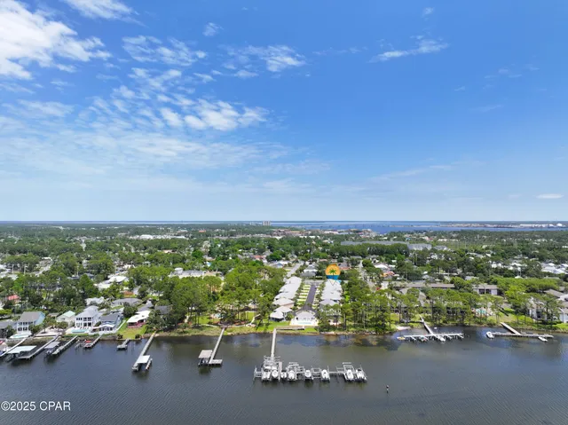 $705,000 | 7009 North Lagoon Drive, Unit 107, Panama City, FL 32408