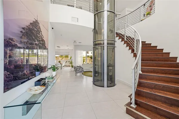 a view of swimming pool with a table and chairs
