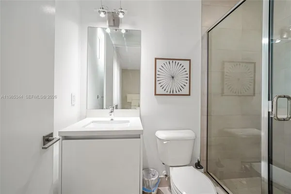 a view of staircase with white walls