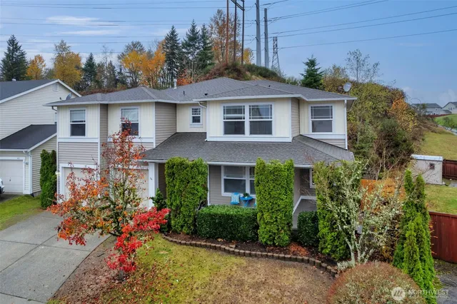 front view of a house with a yard