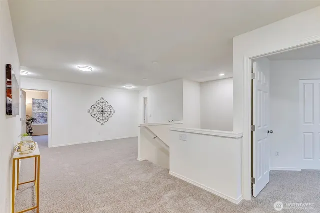 a view of cabinets with wooden floor