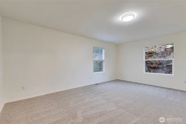 an empty room with a bench