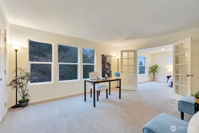 a living room with furniture and a table