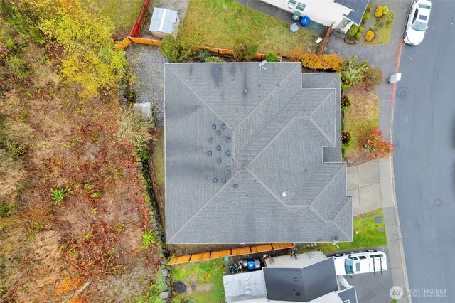 view of a house with a yard and sitting area