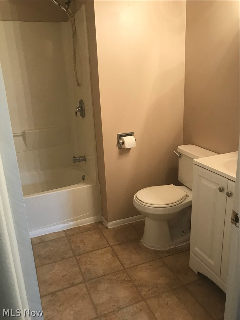 4205 Tapper Road Barberton, OH 44203 - Photo 10 of 12 Bathroom updated with cabinet, sink & light bar.