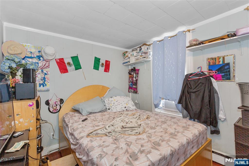120-122 Lodi Street Hackensack, NJ 07601 - Photo 29 of 50 a bedroom with a bed and a bed