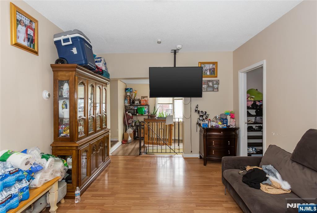 120-122 Lodi Street Hackensack, NJ 07601 - Photo 40 of 50 a living room with furniture and a flat screen tv