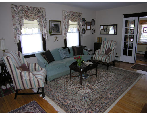 72 Walnut Street Needham, MA 02492 - Photo 4 of 16 a living room with furniture and a window