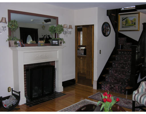 72 Walnut Street Needham, MA 02492 - Photo 6 of 16 a living room with furniture and a fireplace