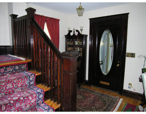 72 Walnut Street Needham, MA 02492 - Photo 8 of 16 a view of a entryway door with wooden floor